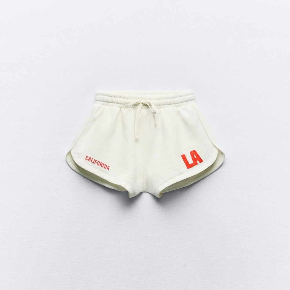 Varsity cream plush shorts Los Angeles CA embroidered red text never worn